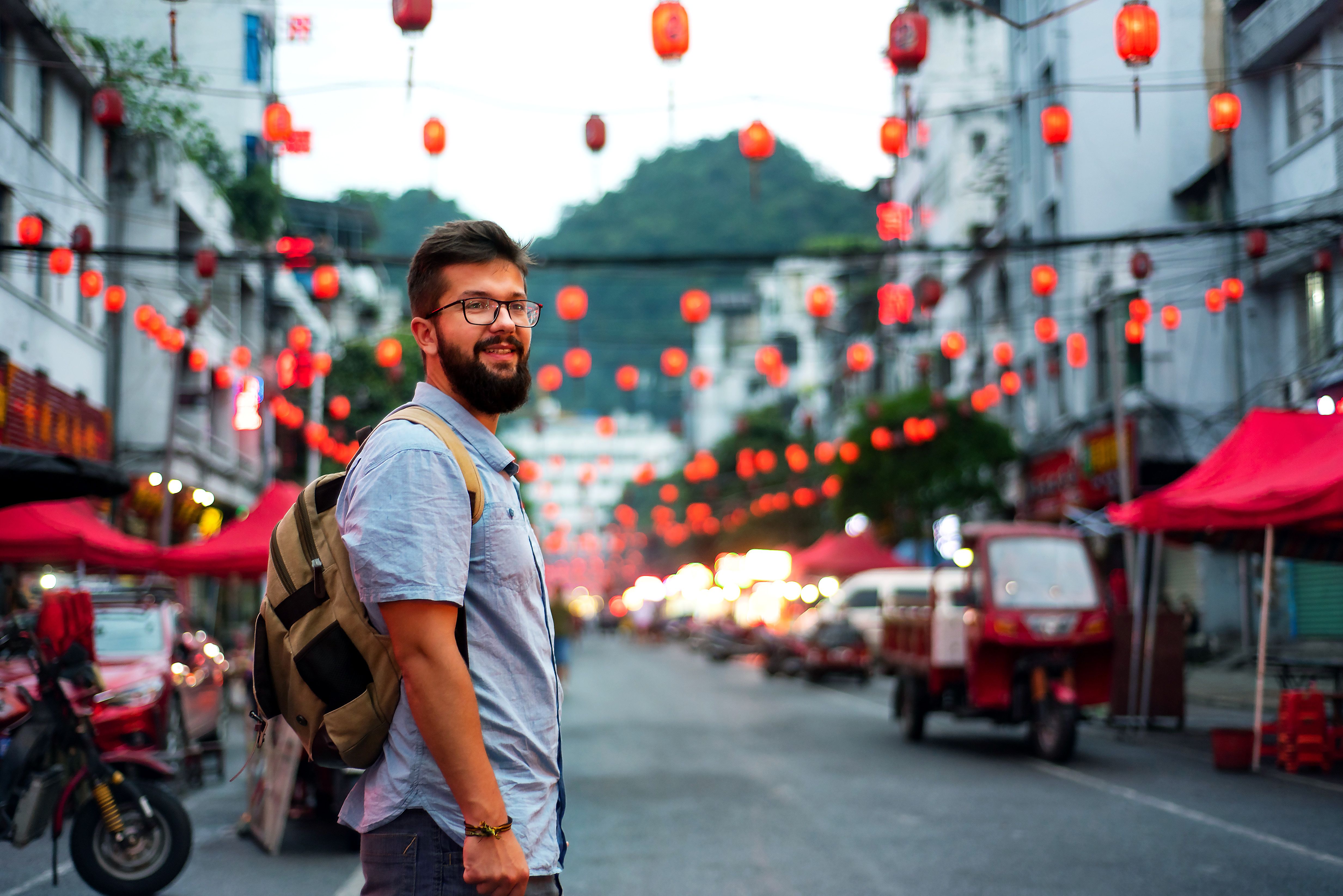 Traveler exploring a street market in China